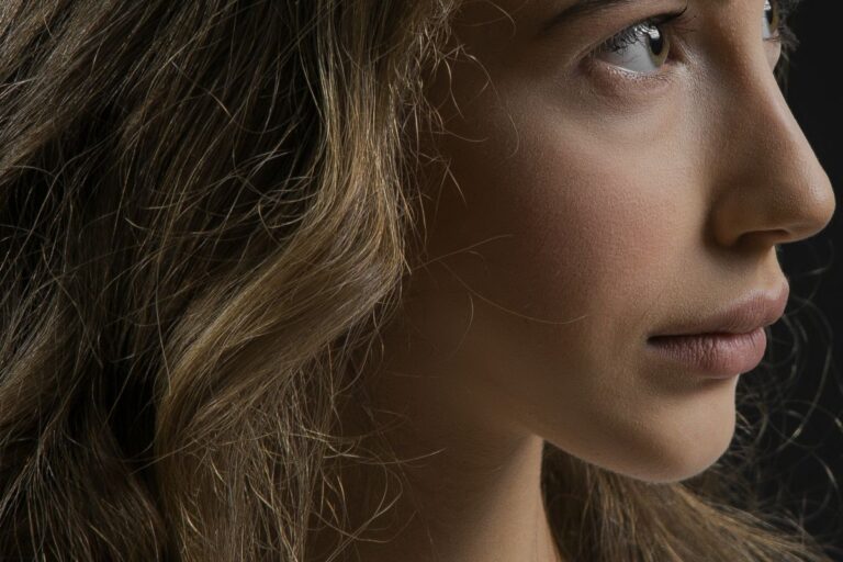 Close-up side profile of a woman showing the nose, lips and chin